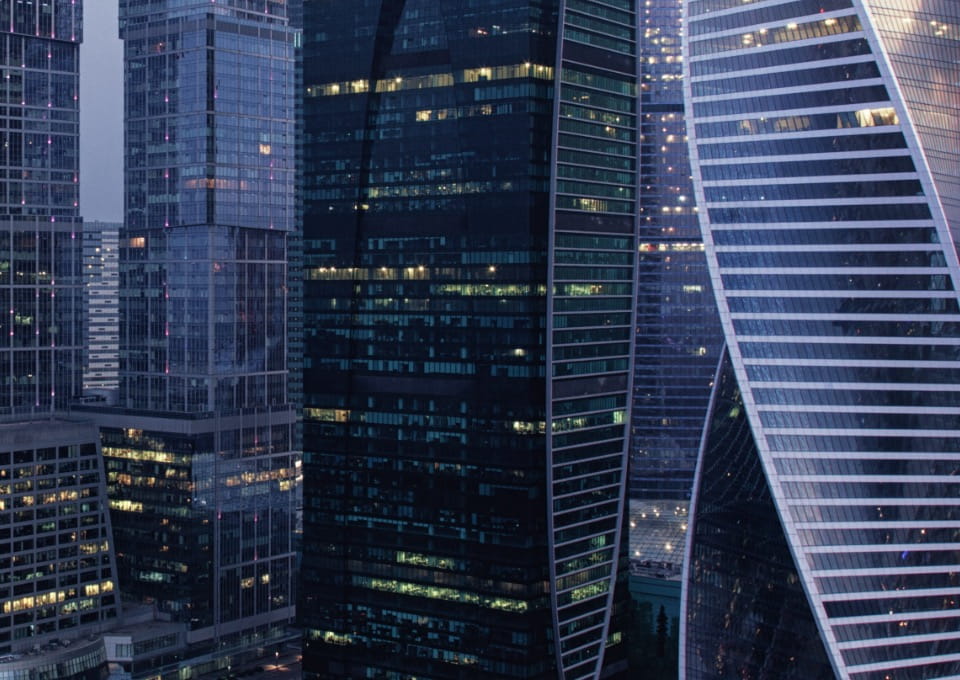 skyscrapers lit up at night